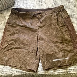 Light brown athletic shorts